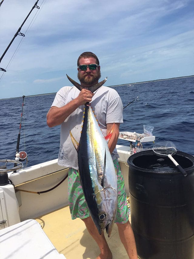 In July, look for flocks of birds to find yellowfin and blackfin tuna.  PHOTO CREDIT: Gusto Charters & Guide Service.