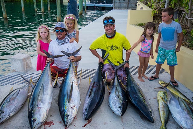 Amelia and Peyton Long with their dad, Aron Long, the captain of Team Long’s Marine, and heaviest tuna winner Wayne Russell, with friends Emma Albury and Lucas Waugh. PHOTO CREDIT: Chris Maingot.