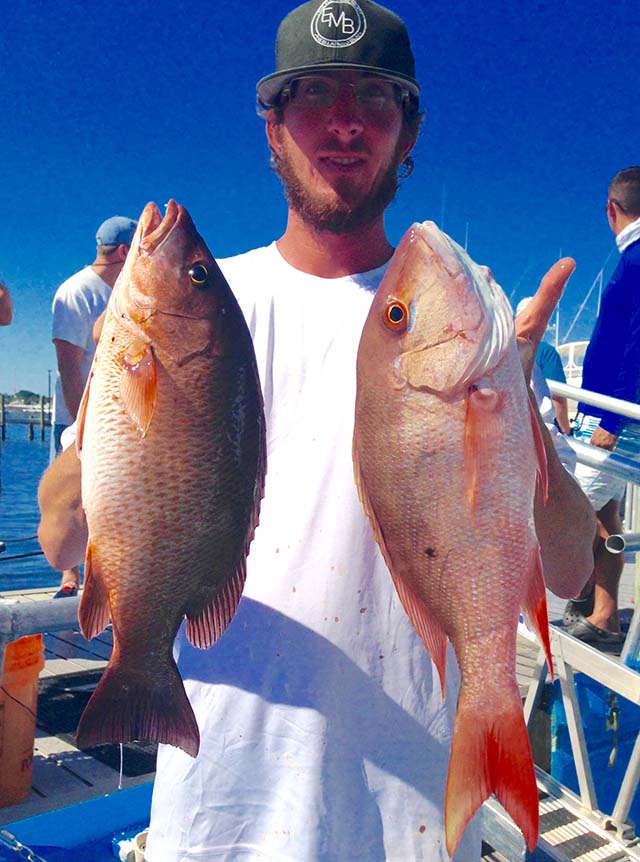 Mangrove and mutton snapper will be caught around similar reef locations during July, like this pretty duo, caught by Shelton Smoak aboard the Safari 1. PHOTO CREDIT: Safari 1.