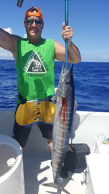 Steven Baureis with a respectable Spanish Wells wahoo caught while fishing with Capt. Ryan Neilly. PHOTO CREDIT: Capt. Ryan Neilly.