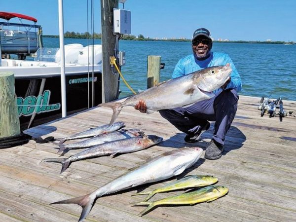 Repeat client Earl Gains with a plentiful ocean bounty of amberjack, mahi and kingfish. Fish were caught from 100 to 200 feet of water.