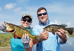 Sadys Mujica and Luke Ford with a double catch of peacock bass.