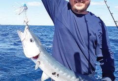 Arthur Tukh of SeaUSmile Lures with a solid barracuda.