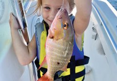 Five-year-old Brooke Mechler caught and released a mutton snapper while fishing with her dad.