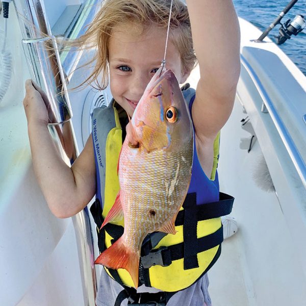 Five-year-old Brooke Mechler caught and released a mutton snapper while fishing with her dad.