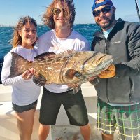 A very lucky black grouper caught with New Lattitude Sportfishing.