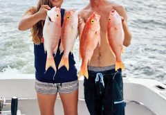 Andrew and Vivian with a nice bunch of snappers caught with New Lattitude Sportfishing.