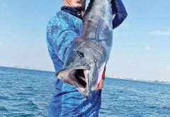 Andrew with a nice wahoo caught with New Lattitude Sportfishing.