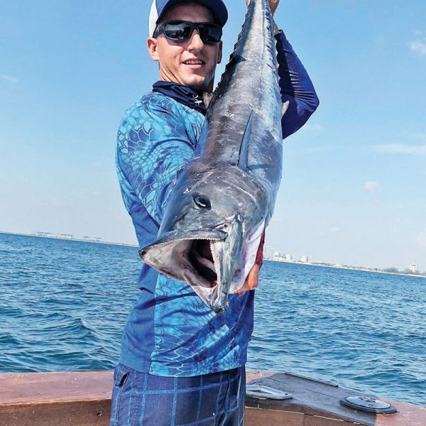 Andrew with a nice wahoo caught with New Lattitude Sportfishing.