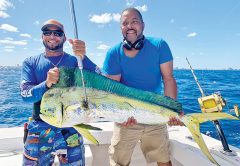 Bobby and angler with a really nice mahi-mahi caught with Fishing Headquarters.