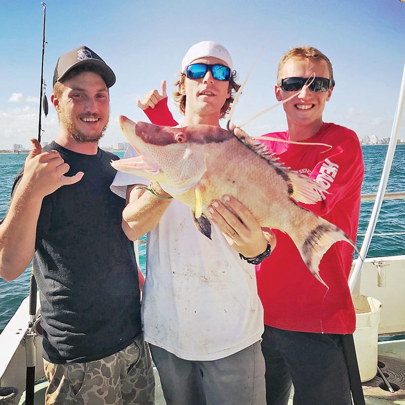 Brian, Kyle and Matt with a nice hogfish caught aboard the Catch My Drift.