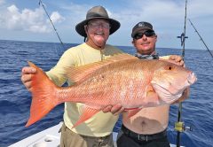 Capt. Paul and Rod with a big mutton snapper caught with Fishing Headquarters.
