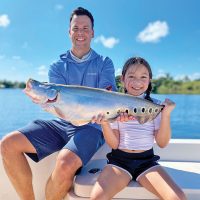 8 year old Isabella and her dad Alex with her first ever clown knife fish.