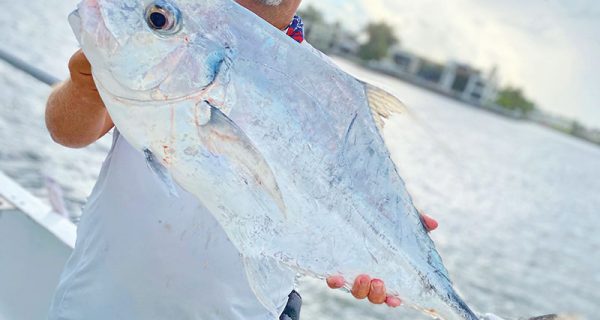 Lucky angler with a tasty African pompano caught aboard the Catch My Drift.