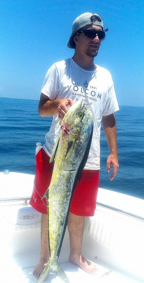 Kadyn with a 20-pound mahi caught out of Fort Pierce inlet. The fish was hooked up on a trolled small live blue runn in 83 feet of water. Photo credit: Capt. Danny Markowski/LottaBull Fishing Charters.
