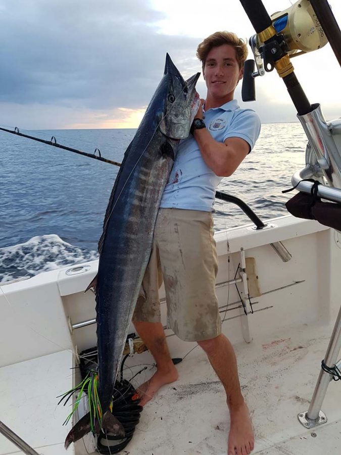 Wahoo caught by Austin Long and Tom Paine a mile off the ledge, south of Port Lucaya Marina. Photo credit: Austin Young.
