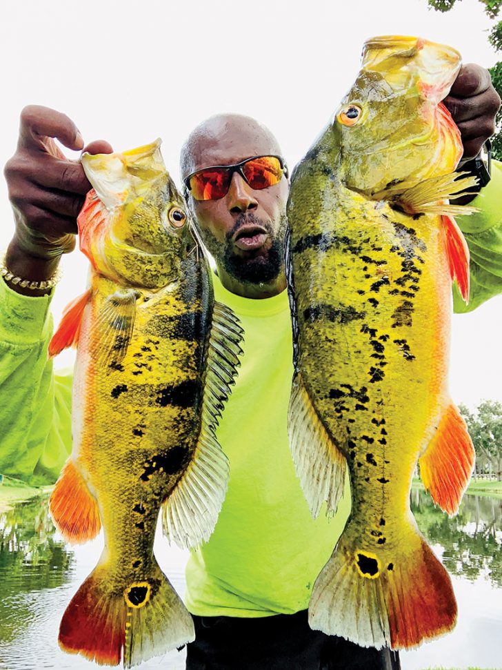Marcus Good with a pair of nice peacock bass.