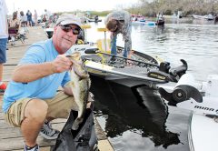 Patrick Hammill released his limit of bass after weigh in at the King of the Glades.