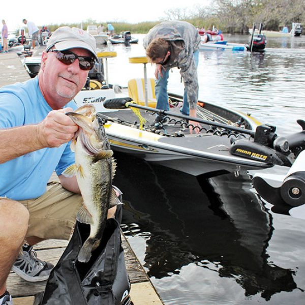 Patrick Hammill released his limit of bass after weigh in at the King of the Glades.