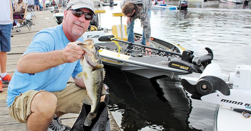 Patrick Hammill released his limit of bass after weigh in at the King of the Glades.