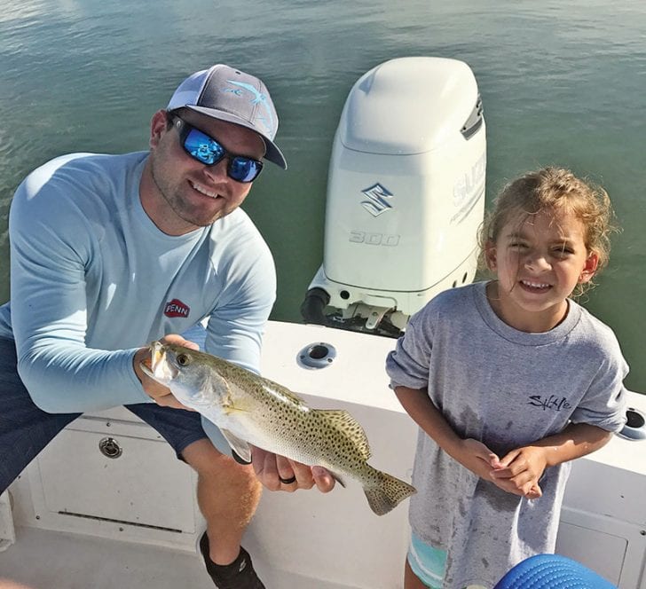 Capt. Ryan put this junior angler on her first seatrout.