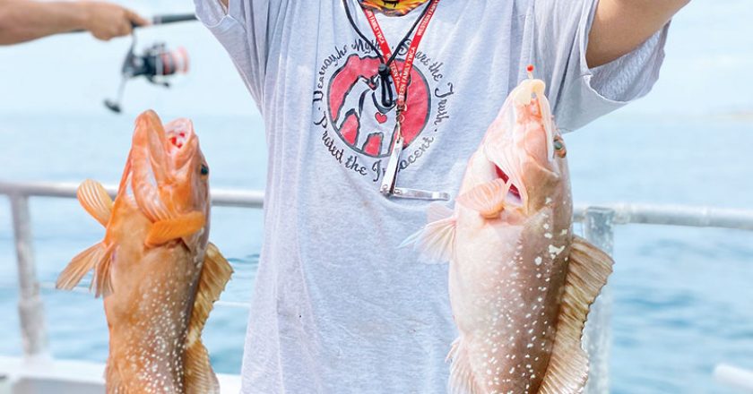 Two for one red grouper caught recently aboard the Catch My Drift.