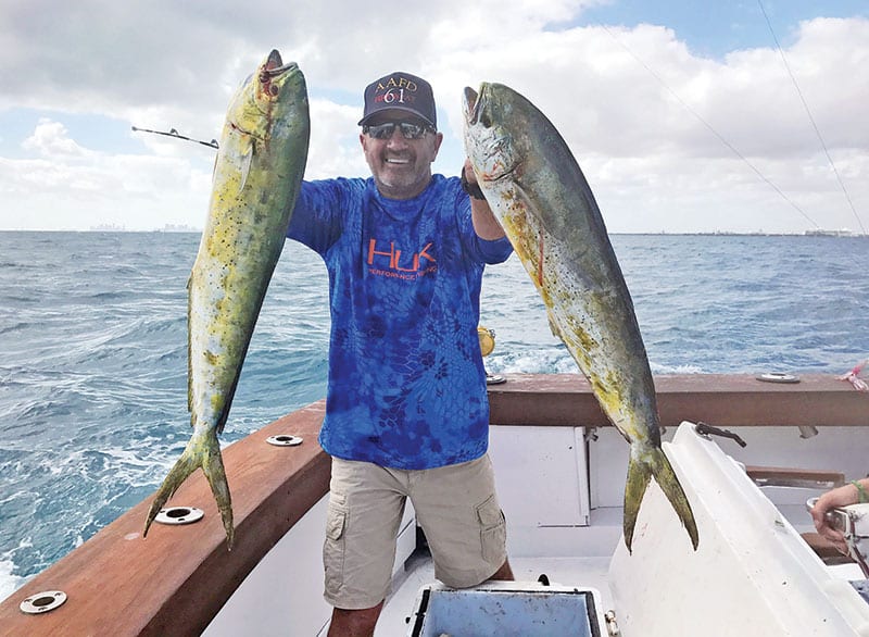 A pair of nice dolphin caught on a charter with Fishing Headquarters.