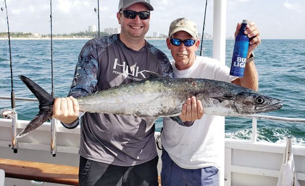 Nice kingfish for these happy anglers on a trip with Fishing Headquarters.