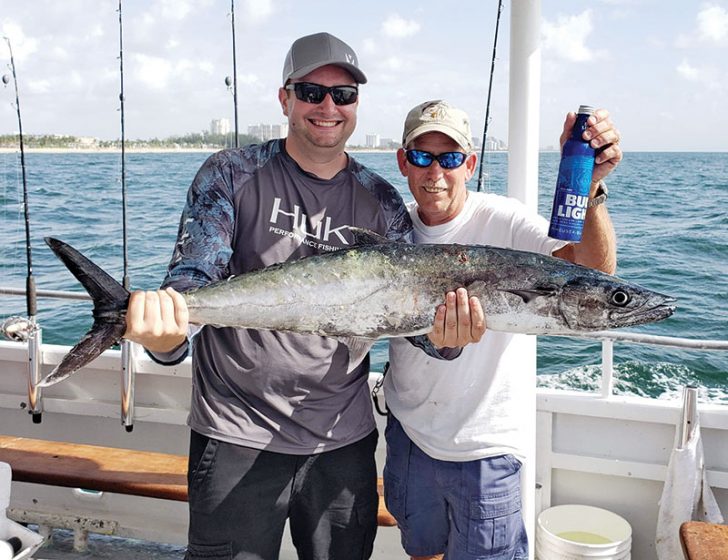 Nice kingfish for these happy anglers on a trip with Fishing Headquarters.