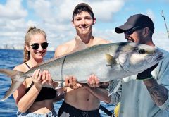 All smiles for these happy anglers aboard the Big Game.