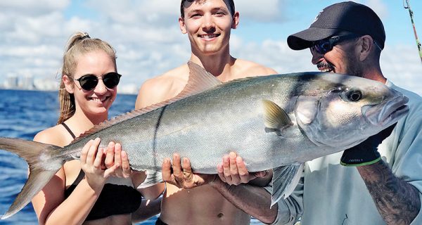 All smiles for these happy anglers aboard the Big Game.