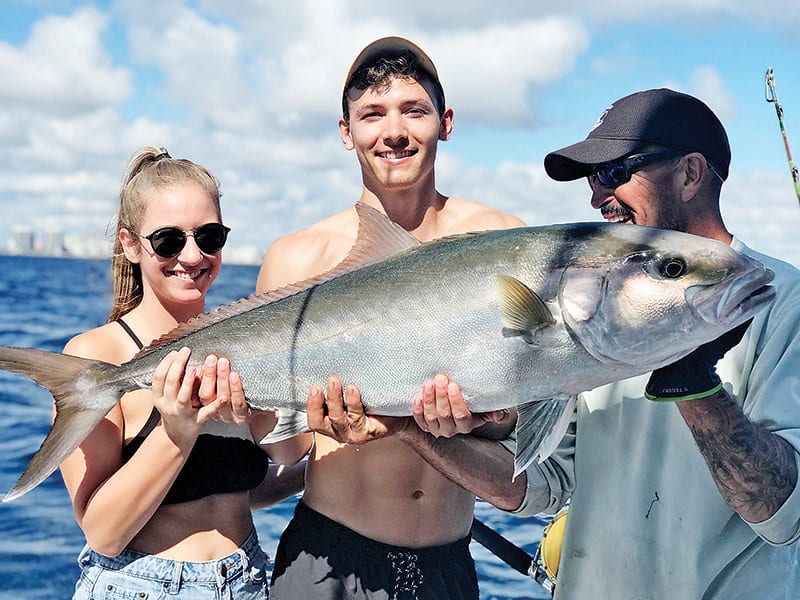 All smiles for these happy anglers aboard the Big Game.