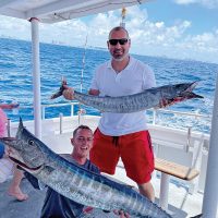 Double header wahoo caught aboard the Catch My Drift.