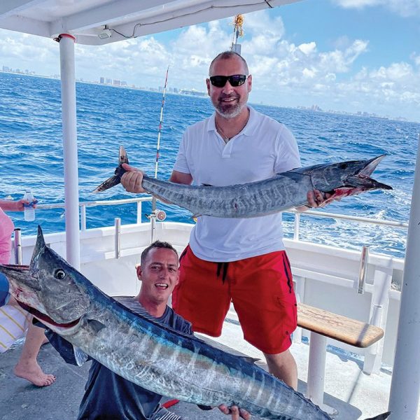 Double header wahoo caught aboard the Catch My Drift.