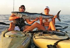 Joe Hector and his step sister, Nicole Krusman with her first wahoo.