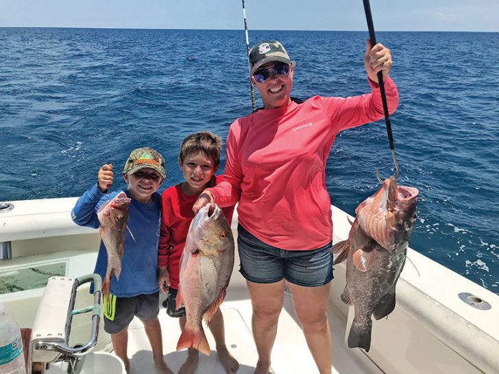 Katie, Mason and Owen with a good bottom fishing catch with Fishing Headquarters