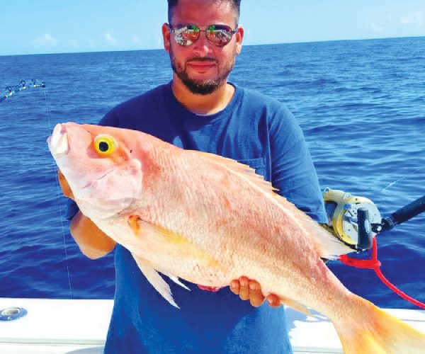 Kenny from Carl's Bait and Tackle with a nice yelloweye snapper.