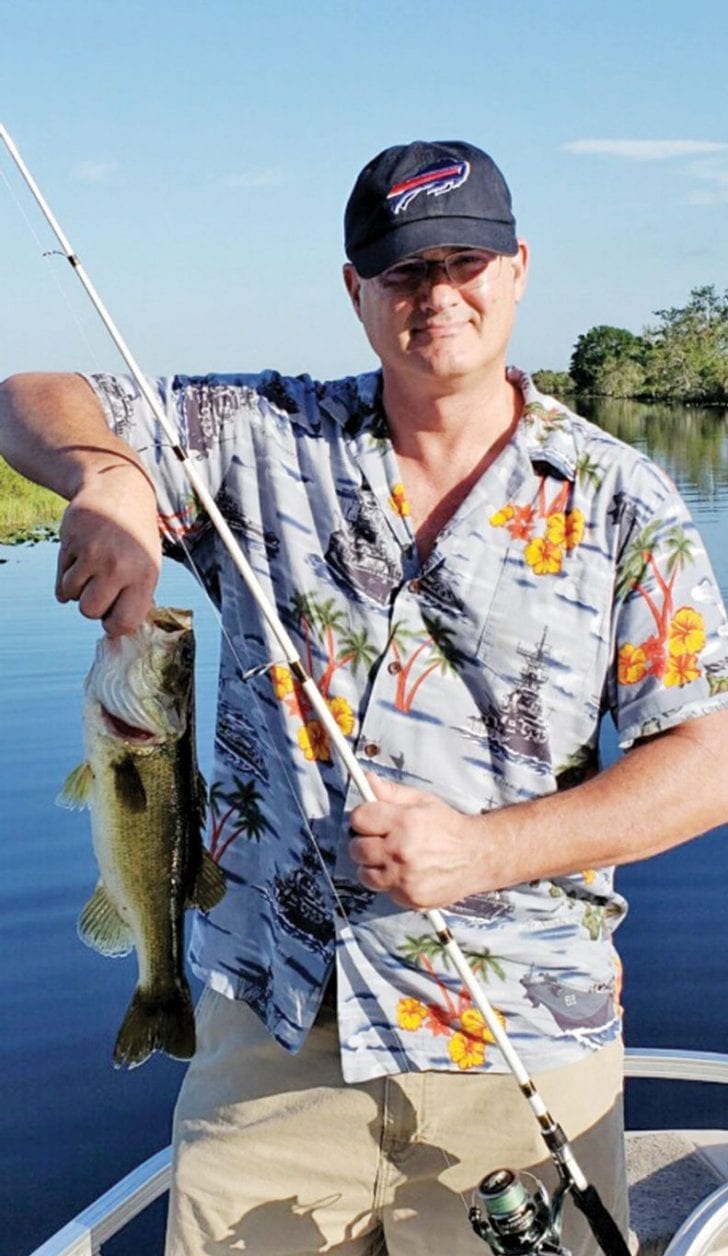 U.S. Marine Colonel Paul with his 1st ever bass.