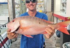 Matt with a nice mutton snapper just caught aboard the Catch My Drift.