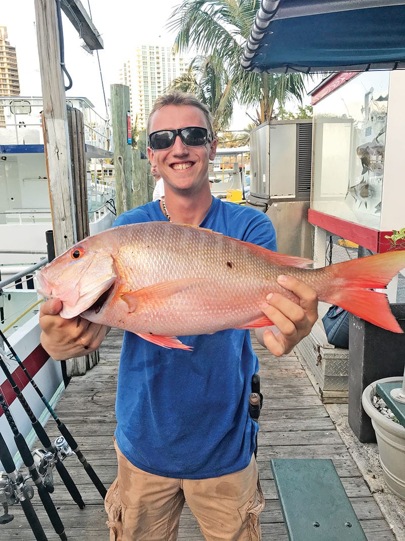 Matt with a nice mutton snapper just caught aboard the Catch My Drift.