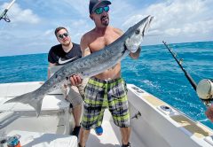 Mick with a big barracuda caught with New Lattitude Sportfishing.