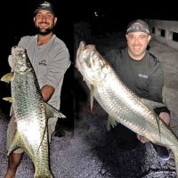 Jay Spalding and Mike Lipski with twin tarpon caught in Fort Lauderdale.