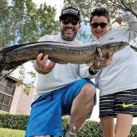Adam Lipski, VP of Sales at Reel Deal Bait & Tackle, slayed this snakehead while fishing with his dad.