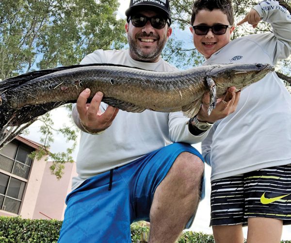 Adam Lipski, VP of Sales at Reel Deal Bait & Tackle, slayed this snakehead while fishing with his dad.
