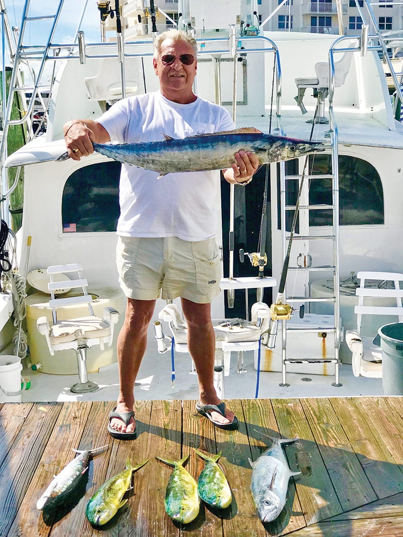 Nice catch of a wahoo and some dolphin by Tom on a sportfish charter.