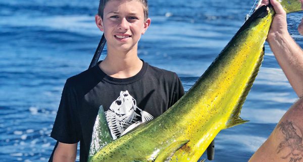 Nice dolphin caught by this young angler aboard the New Lattitude.