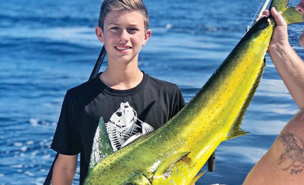 Nice dolphin caught by this young angler aboard the New Lattitude.