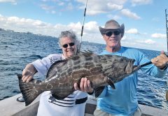 Nice grouper for these happy anglers aboard the 'New Lattitude' Sportfishing Boat.