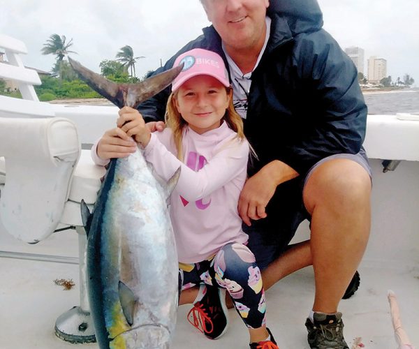 Nice tuna caught by this dad and daughter team fishing with Fishing Headquarters.