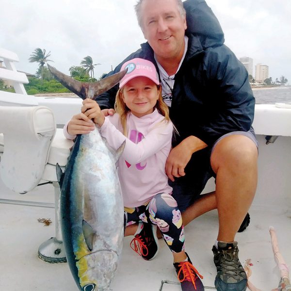 Nice tuna caught by this dad and daughter team fishing with Fishing Headquarters.